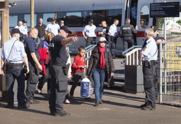 Halverade bidrag till nyanlända ökade kriminaliteten